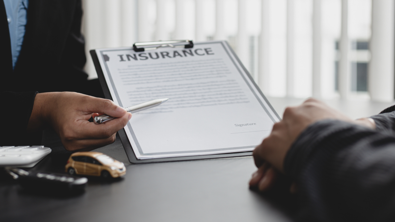 Insurance advisor reviewing coverage with client